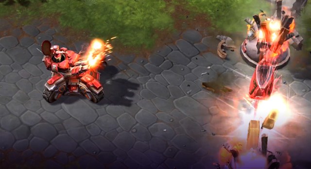 A siege tank fires at medieval towers